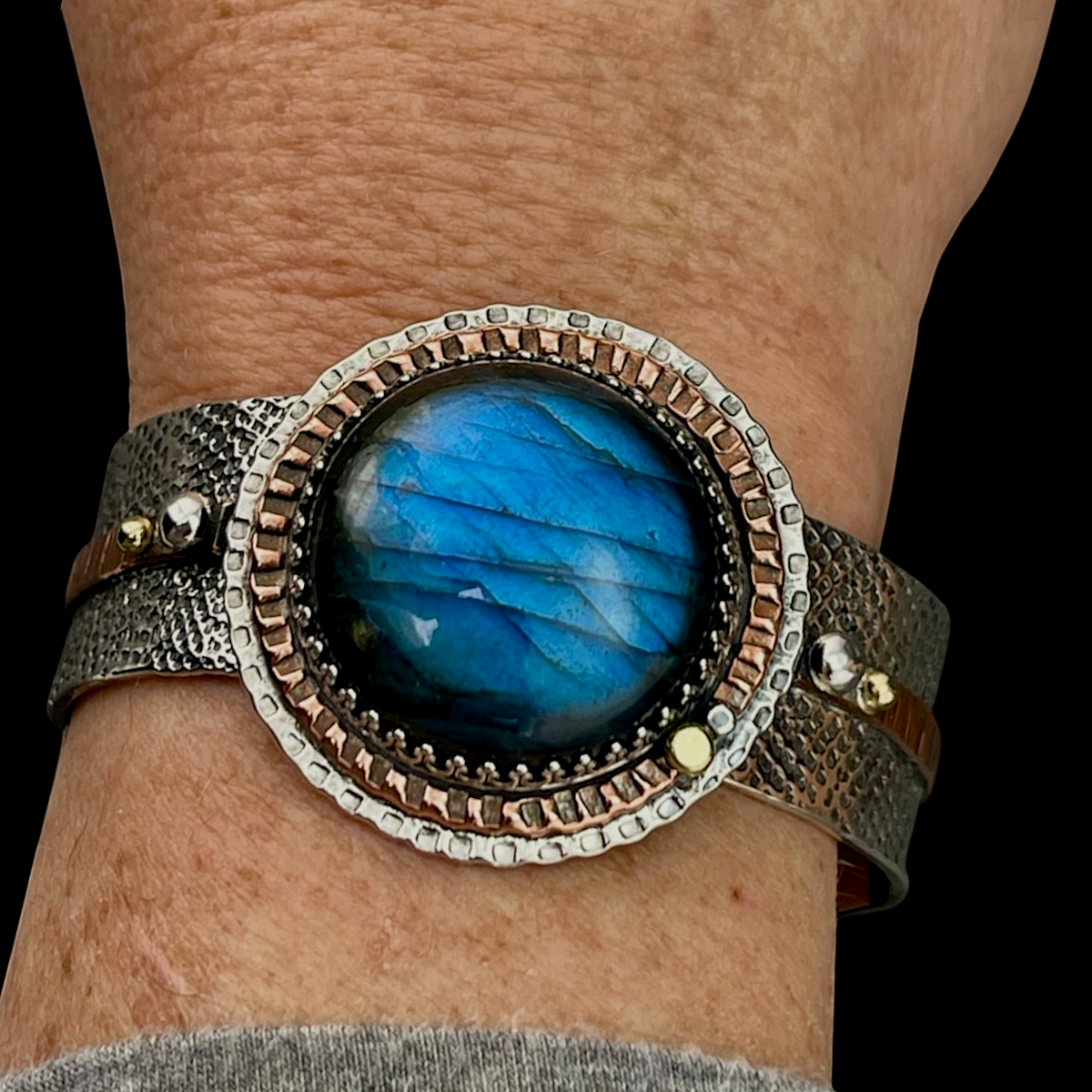 Labradorite Mandala cuff bracelet worn on the wrist