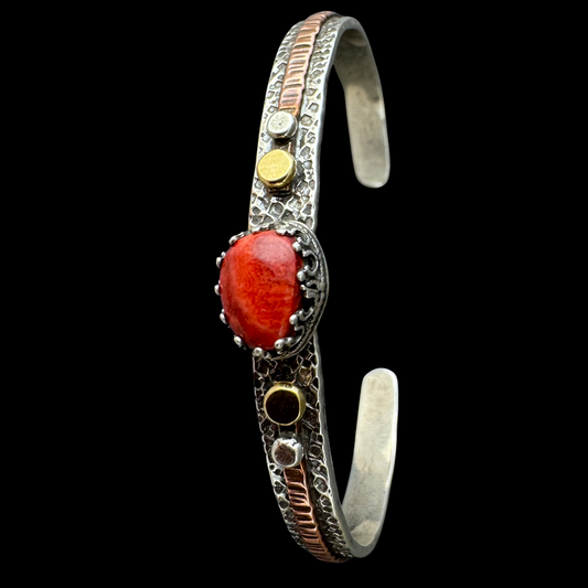 Red coral cuff bracelet in sterling silver with 18K gold and copper accents