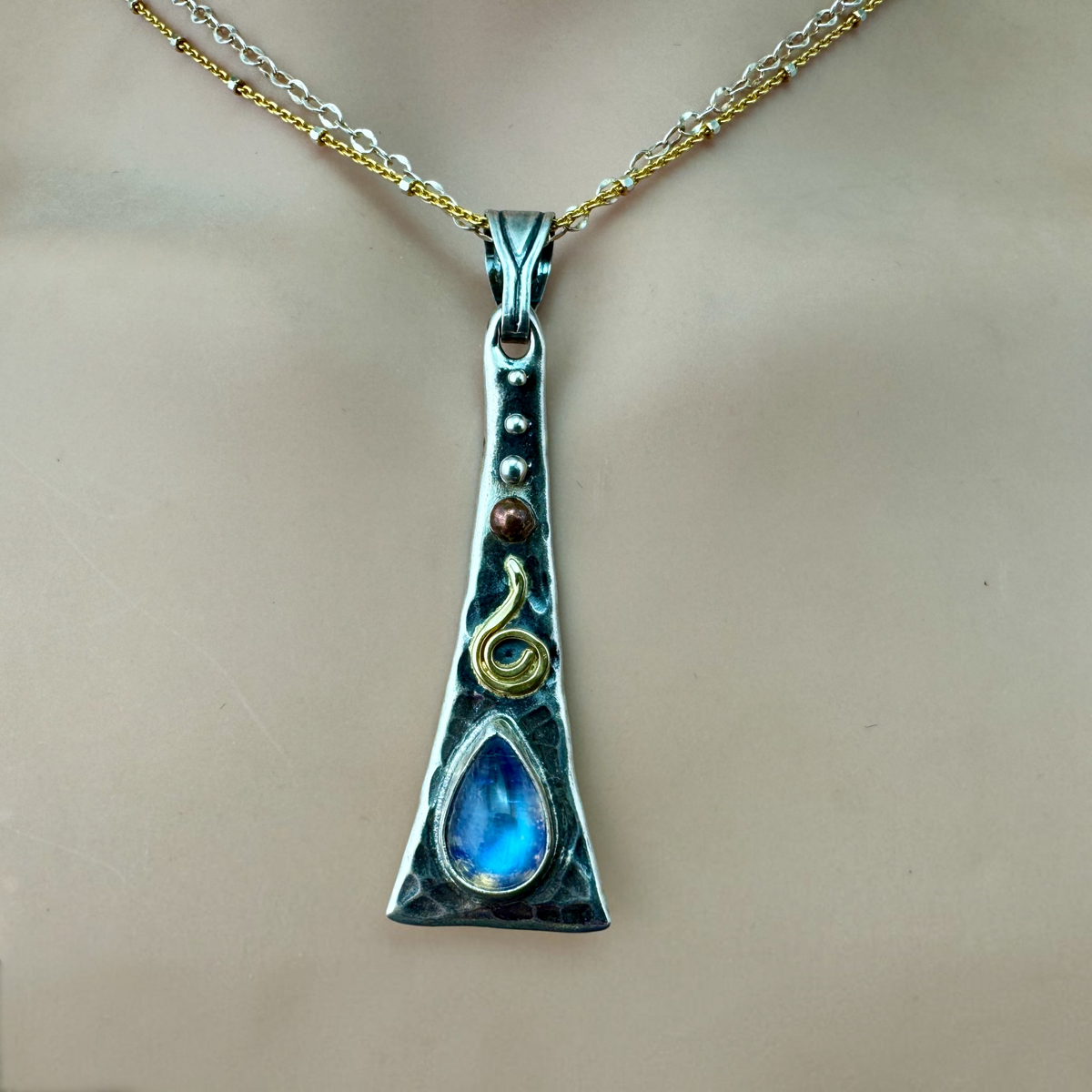Rainbow Moonstone Triangle Flair Necklace worn, on a double chain of sterling silver and gold fill