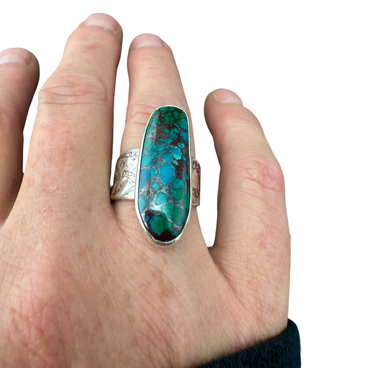 Azurite oval ring worn on the hand