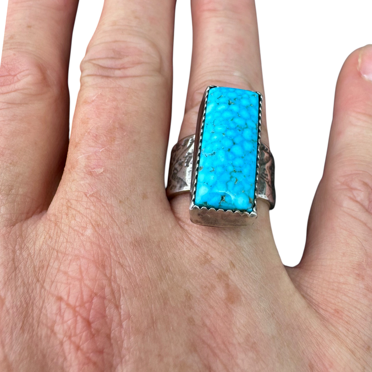 Kingman Turquoise rectangle ring worn on the hand